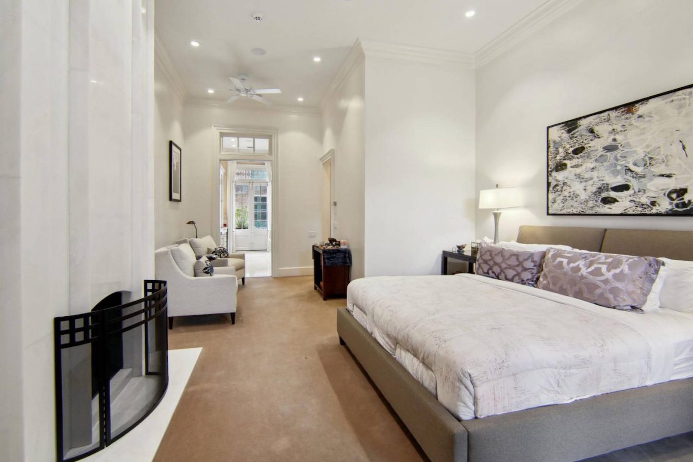 Primary bedroom suite with fireplace