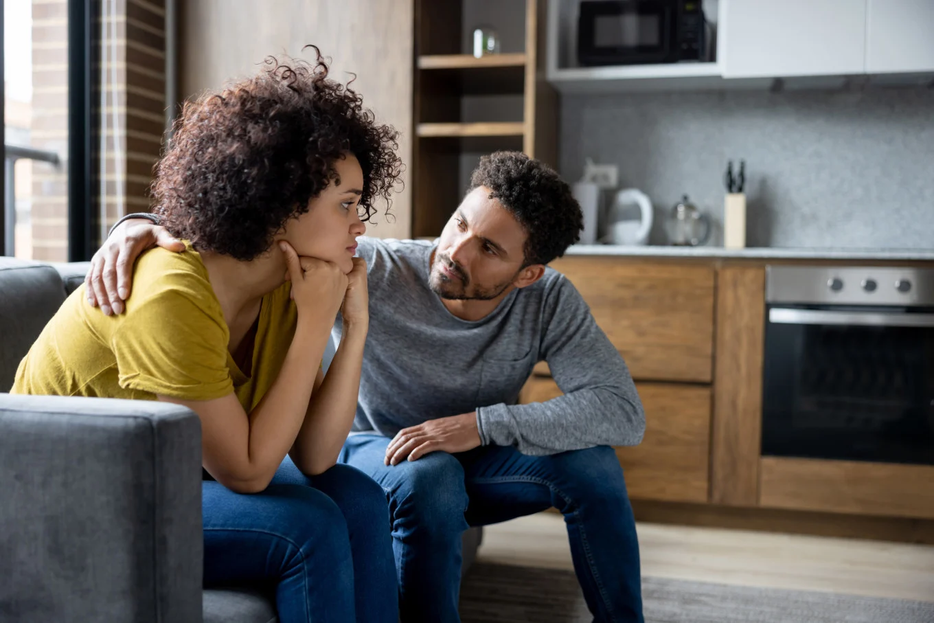 man talking to woman