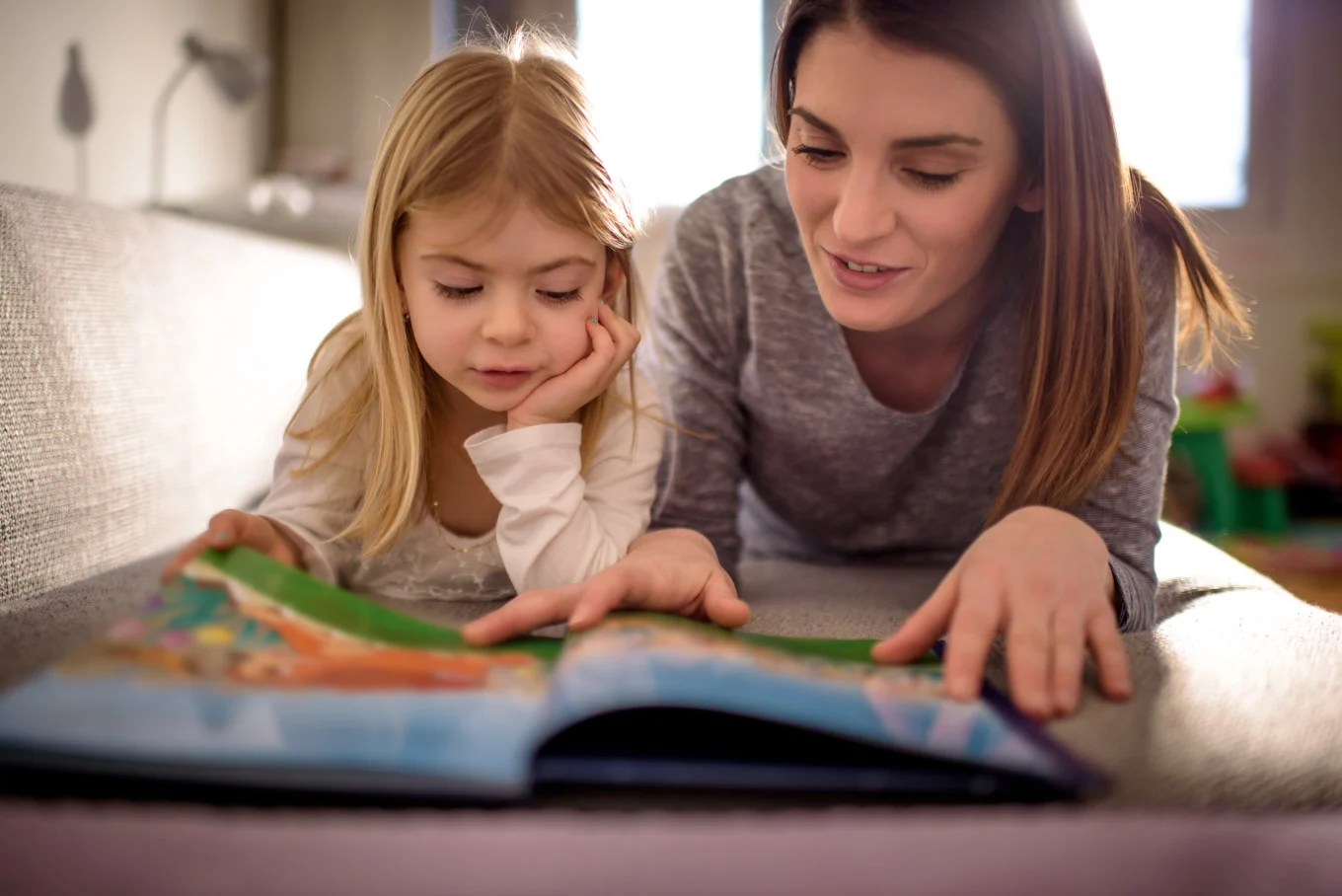 mom and daughter reading