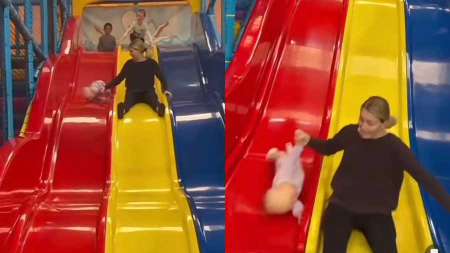 Baby Slips Slowly Down Slide  Showing up to work on Monday