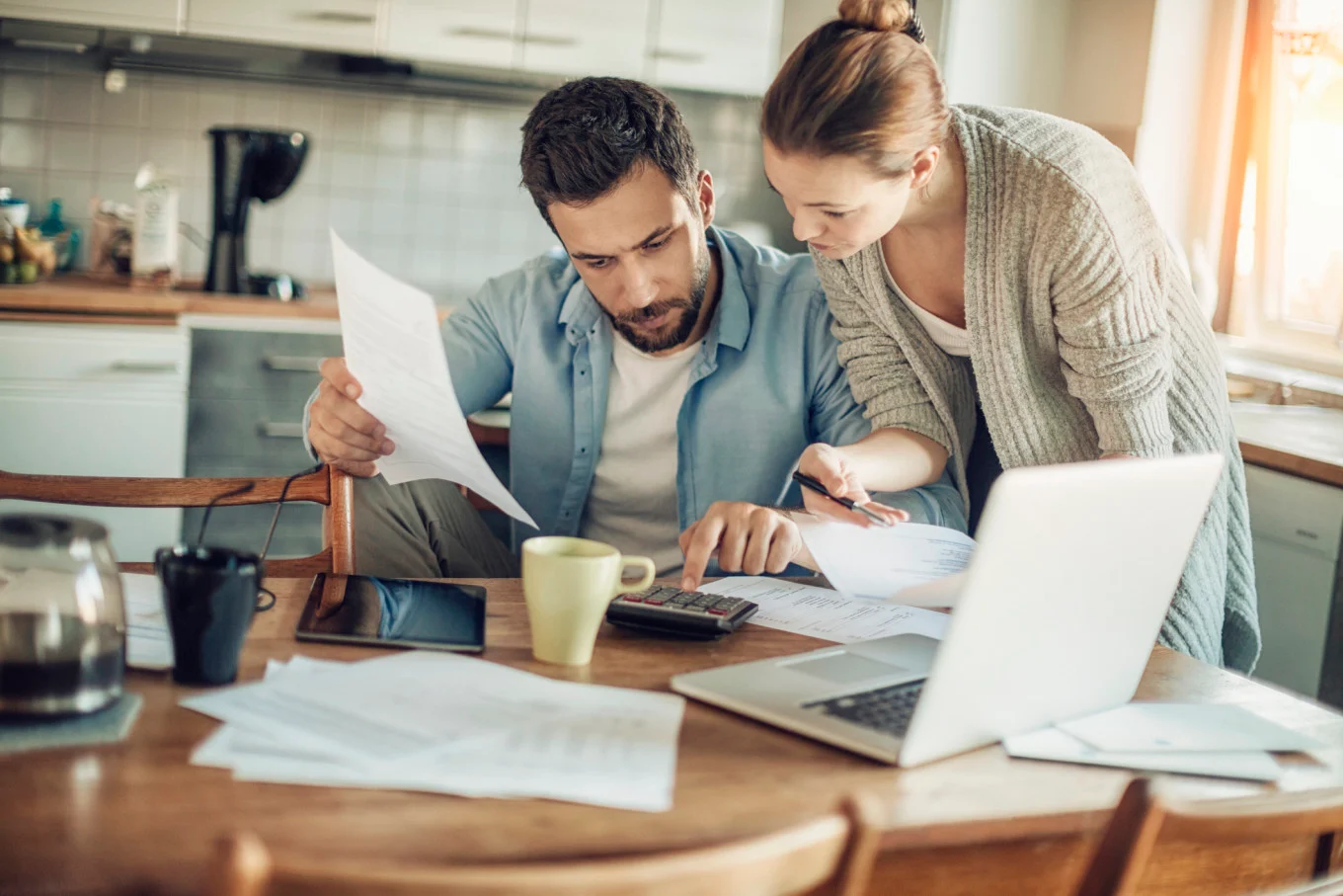 couple looking at bills