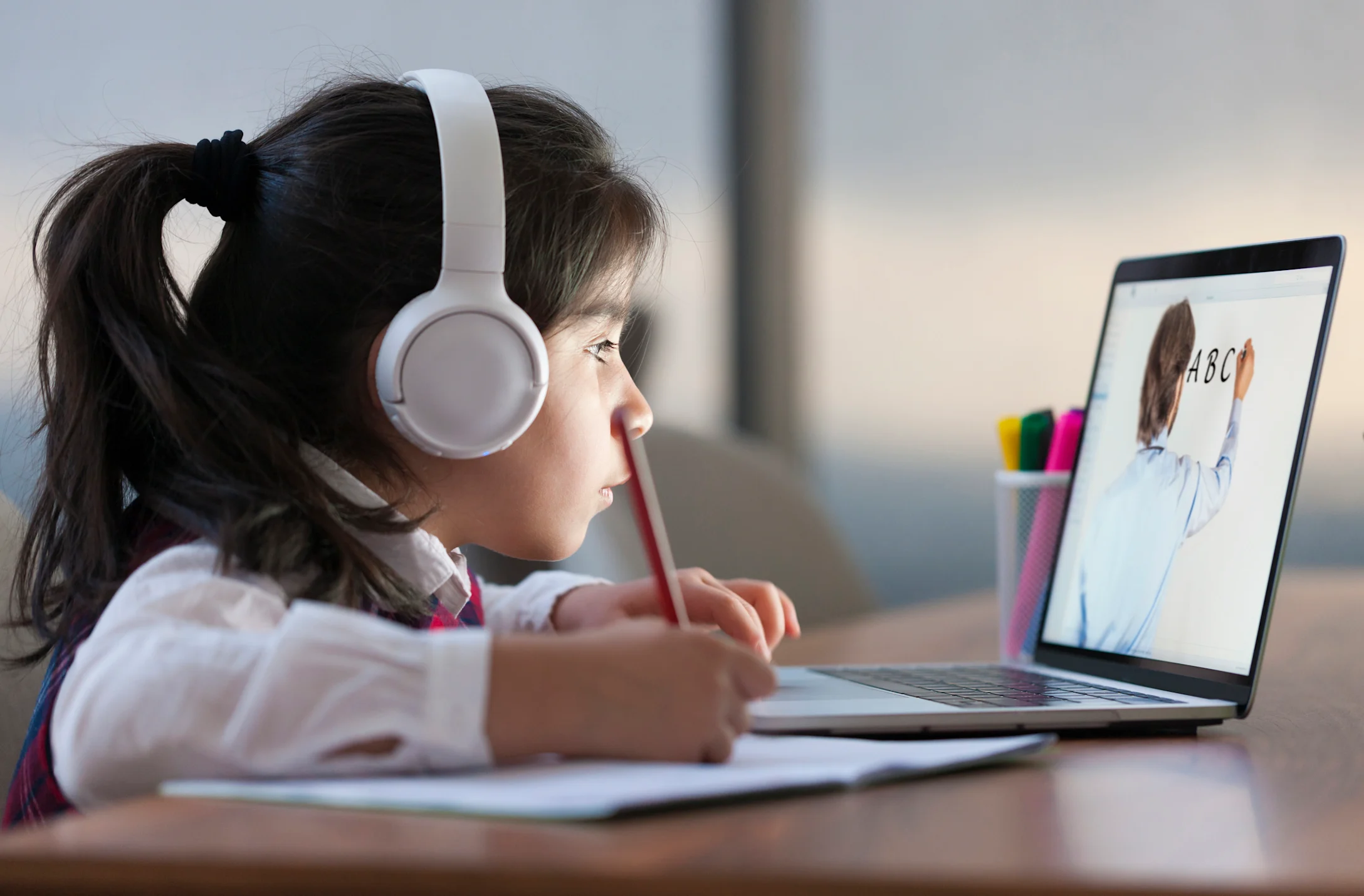 kid doing remote schooling