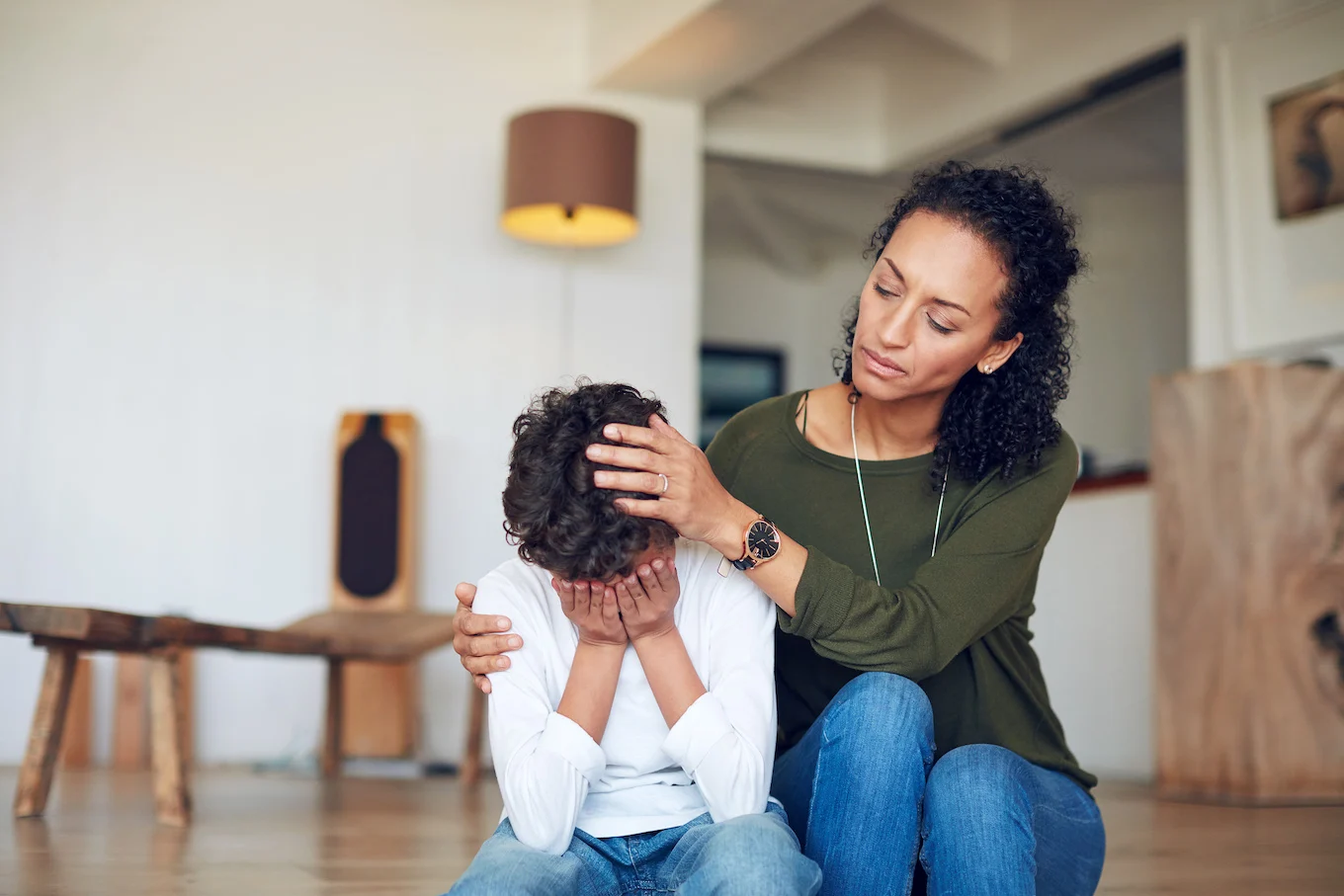 mom comforting son