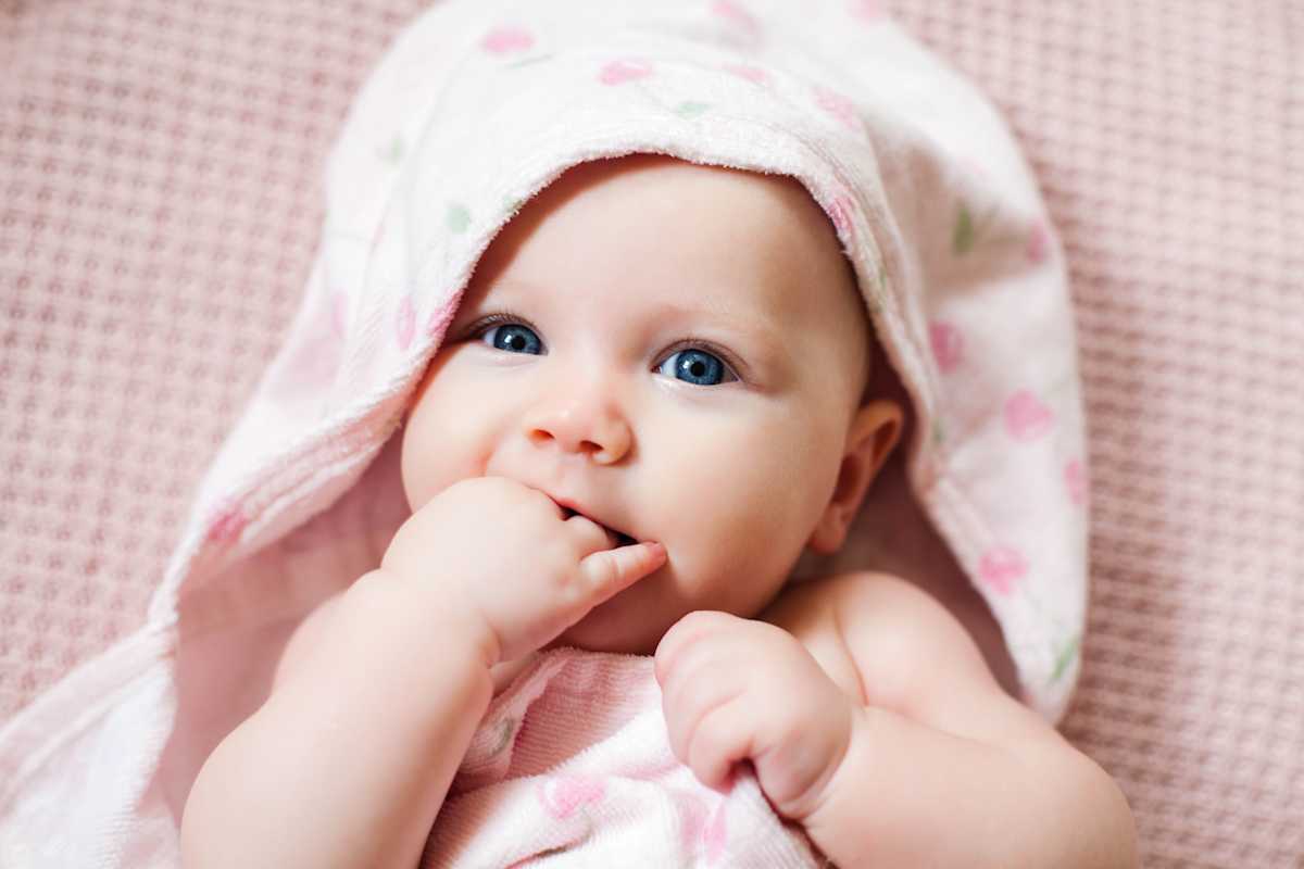 baby girl wrapped in blanket