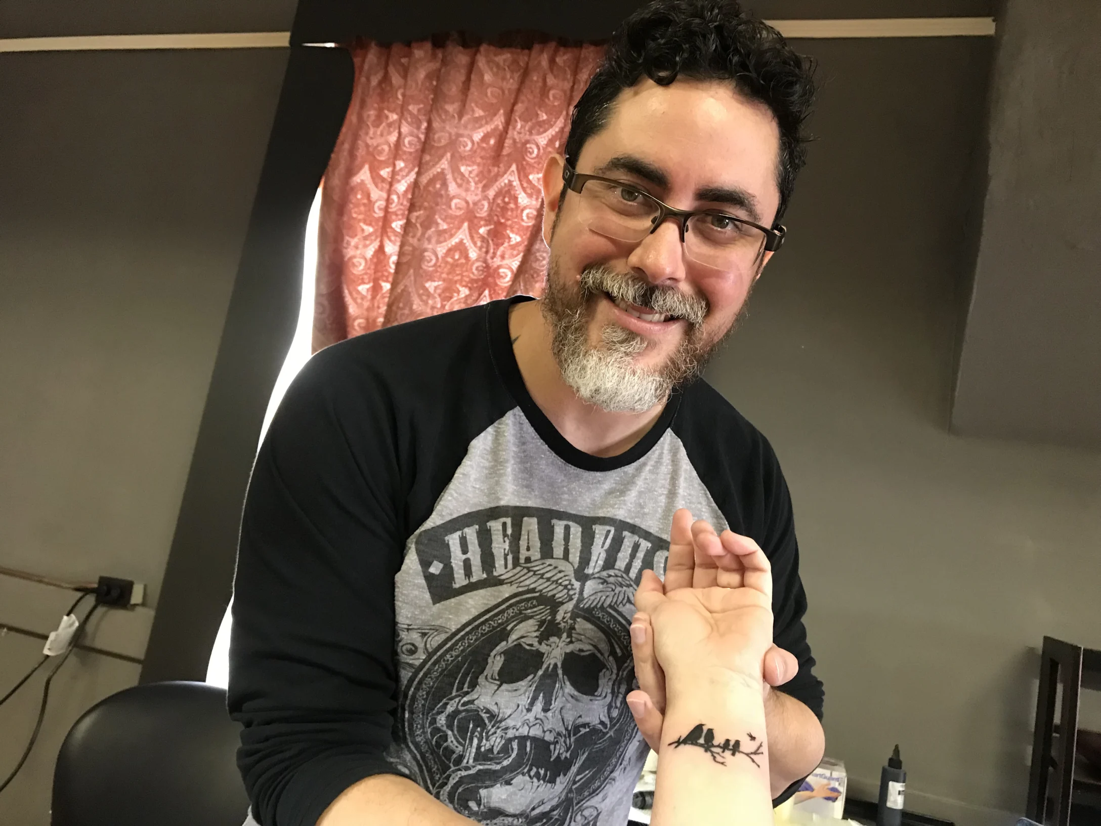 Jose Cruz, tattoo artist, gives memorial tattoo