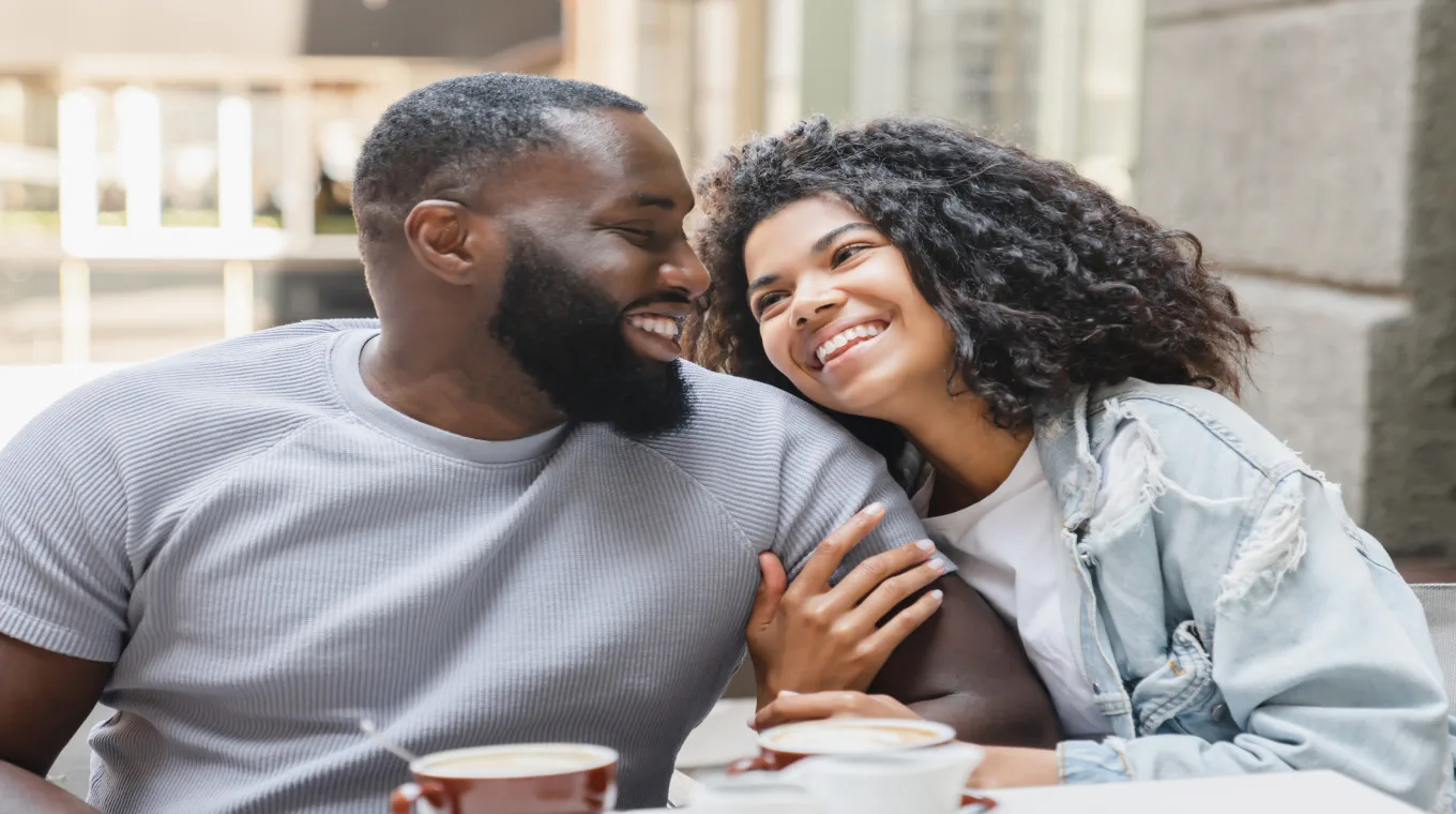 Black couple talking and laughing