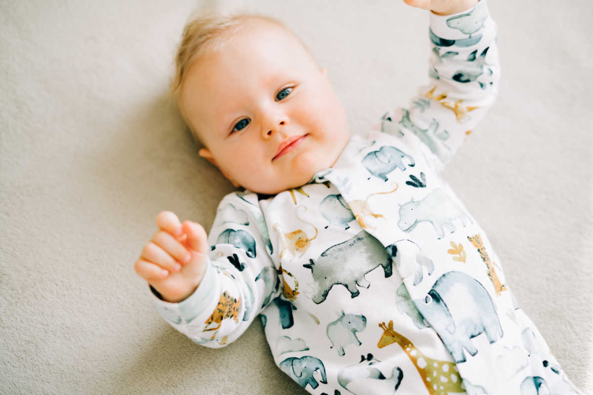 baby boy in animal pajamas
