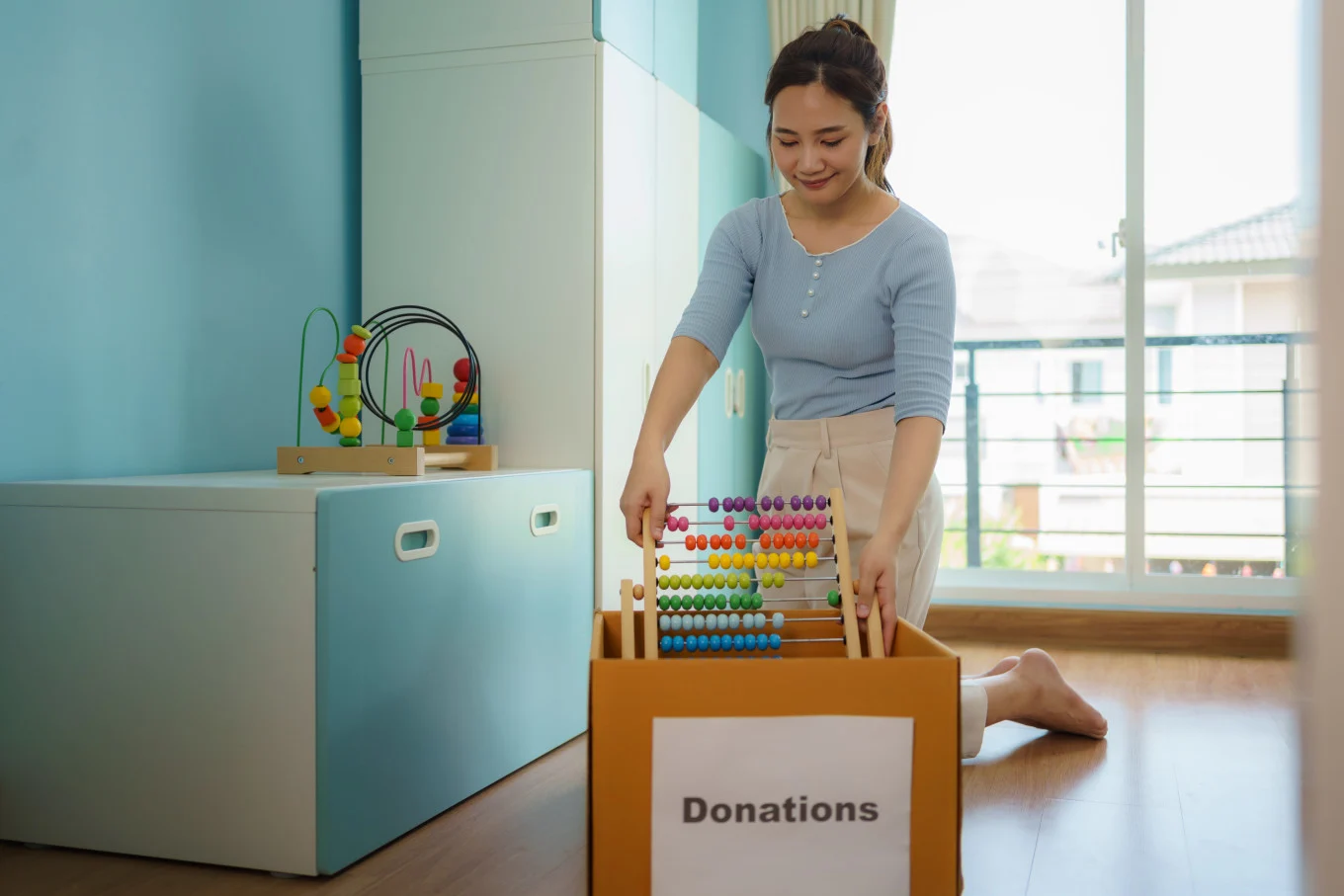 mom collecting toys for donation