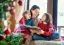 mom reading to her children at the holidays-placeholder