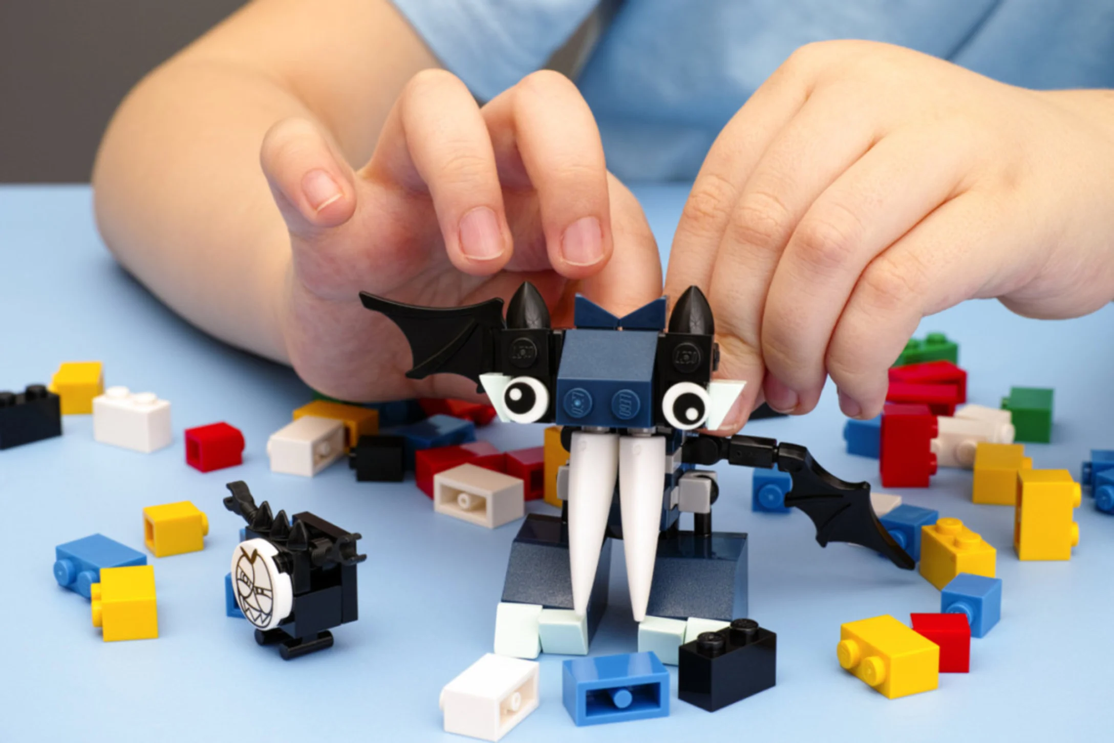 Kid playing with Legos