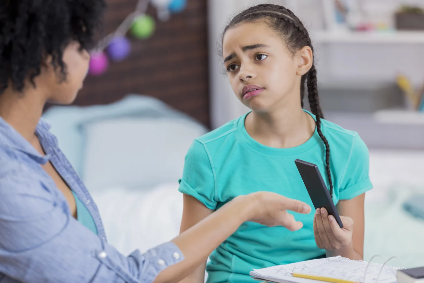 mom taking away daughter's smartphone