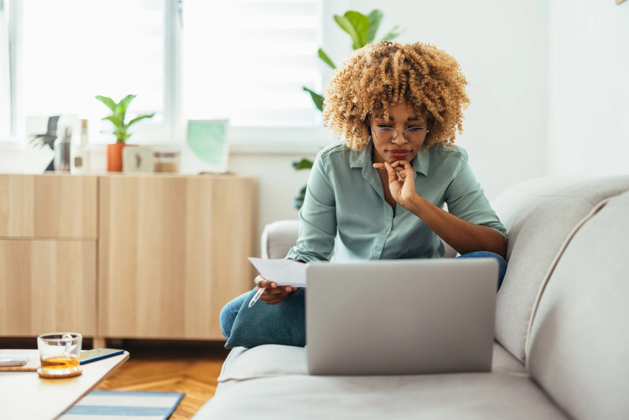 Woman paying bills