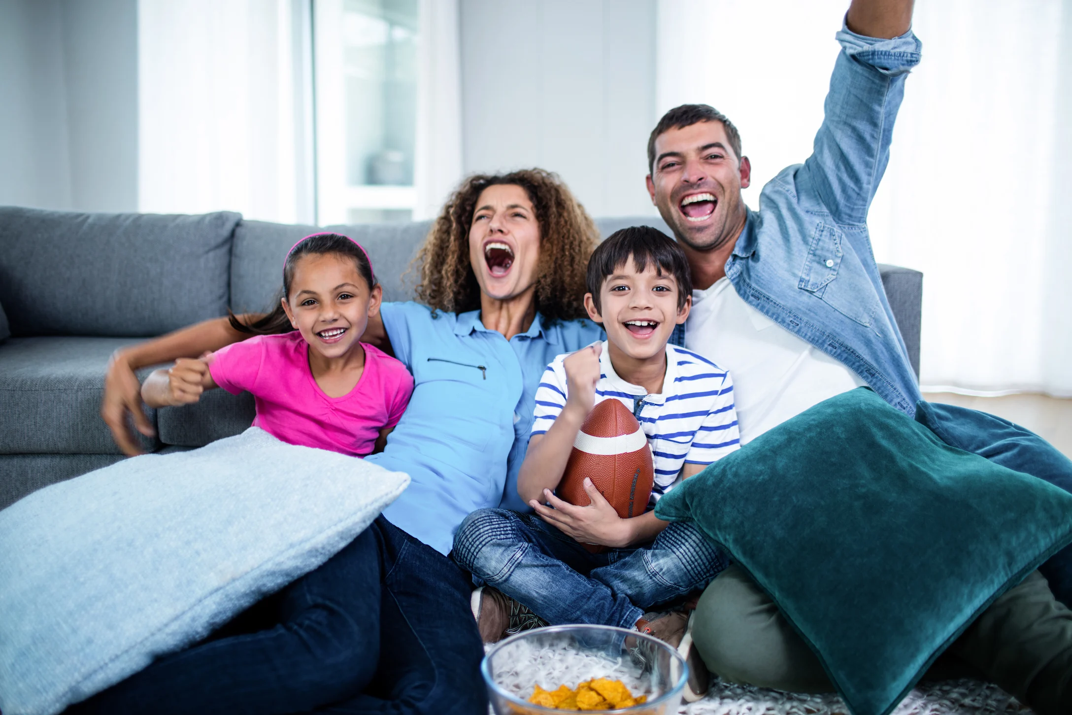 family watching football together