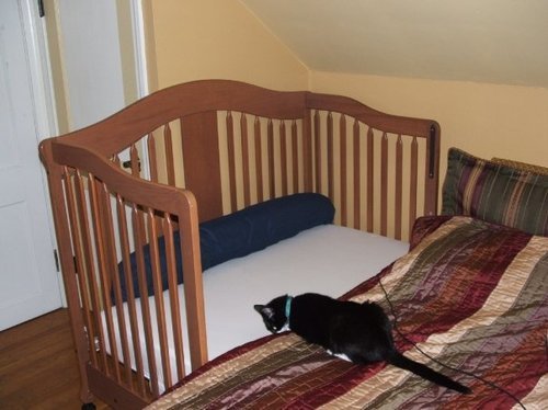 crib against bed