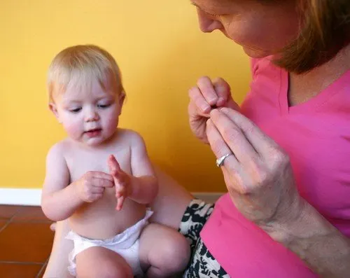 baby using sign language
