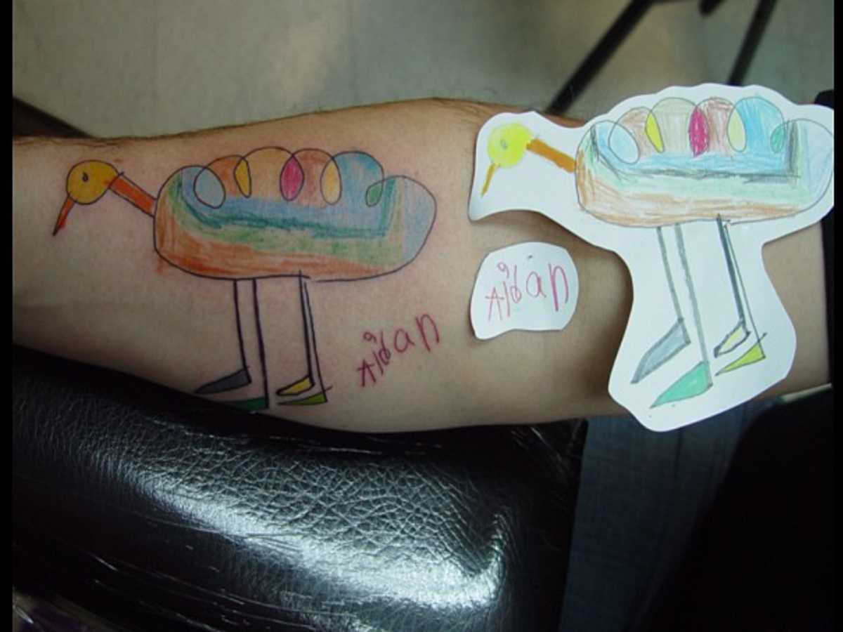 19 Awesome Pieces of Kid Art Parents Have Tattooed on Their Bodies |  