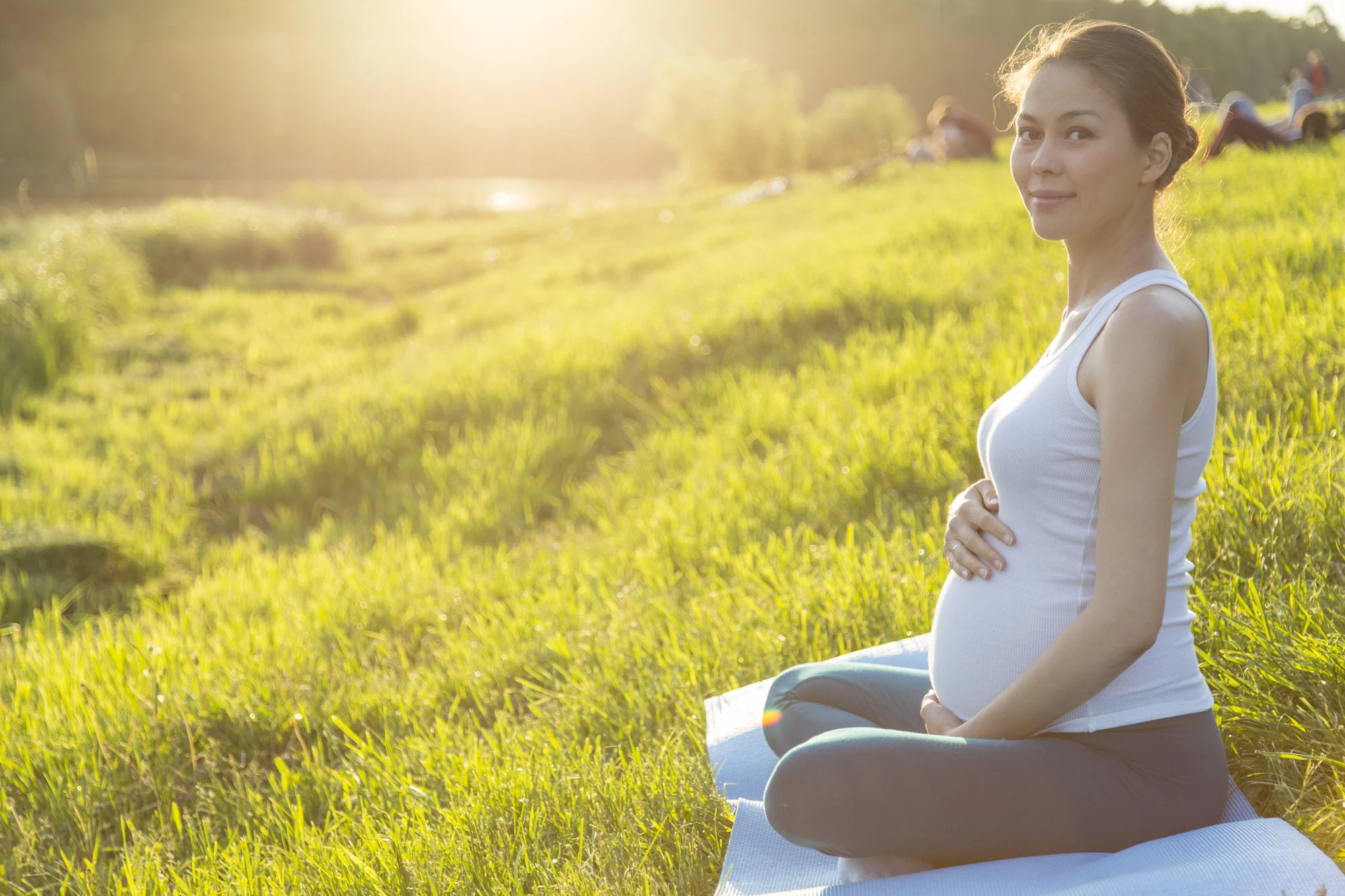 pregnant woman grass