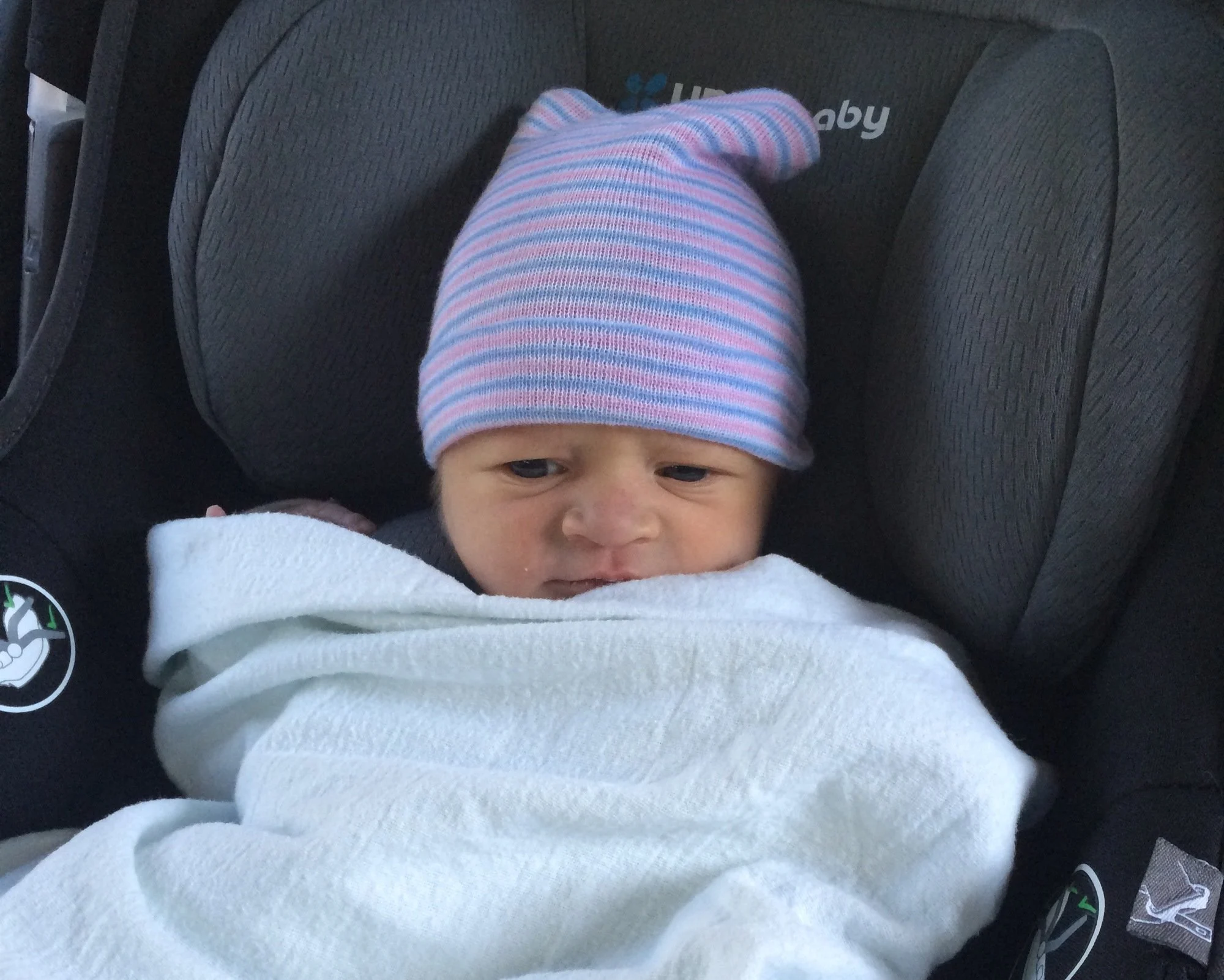 newborn baby in car seat