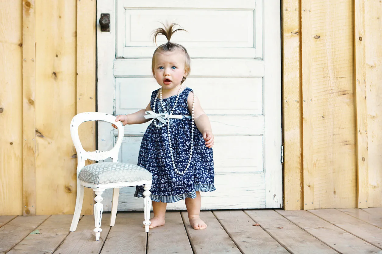 Baby Girl by Antique Door