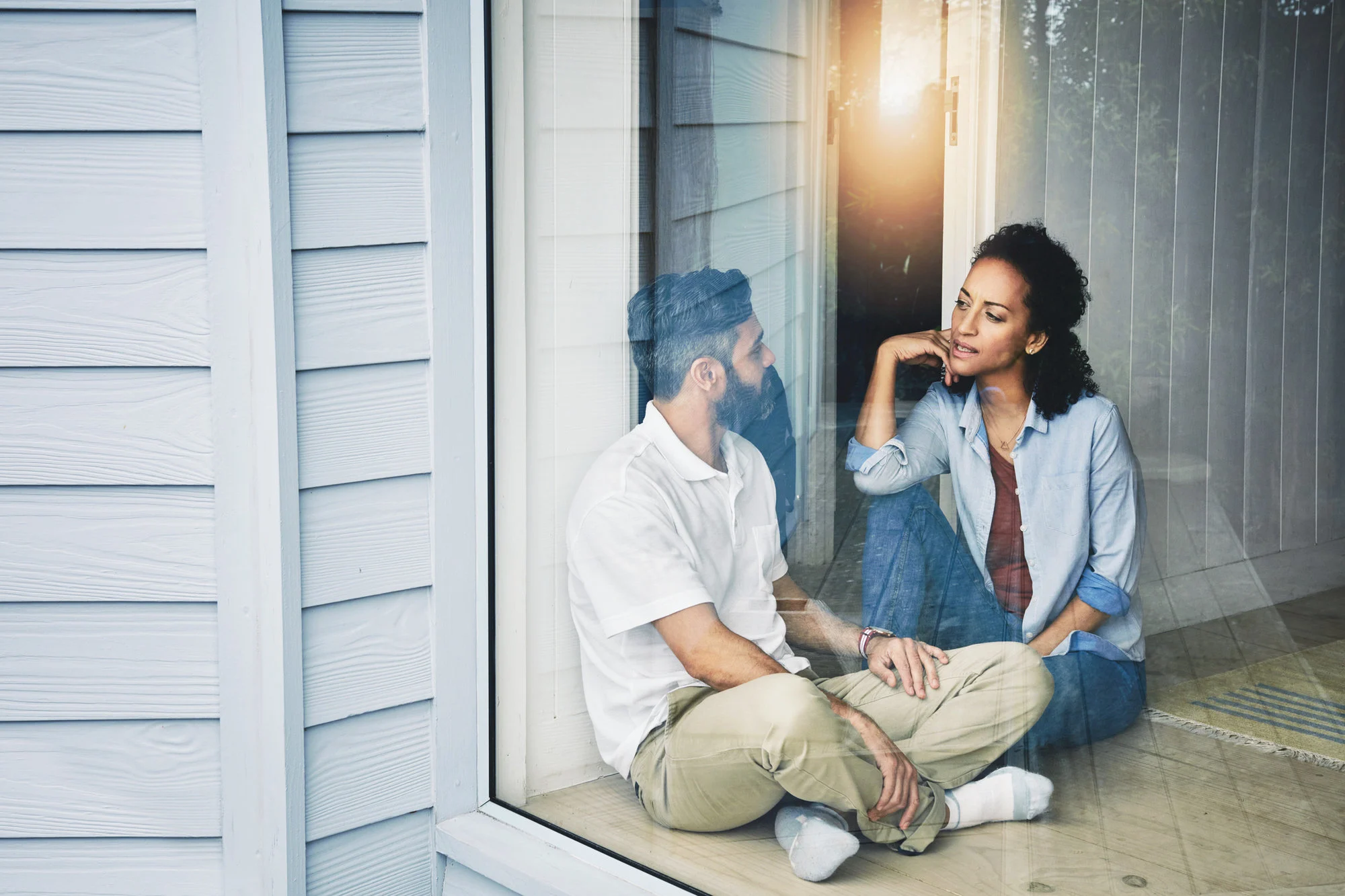 man and woman in conversation