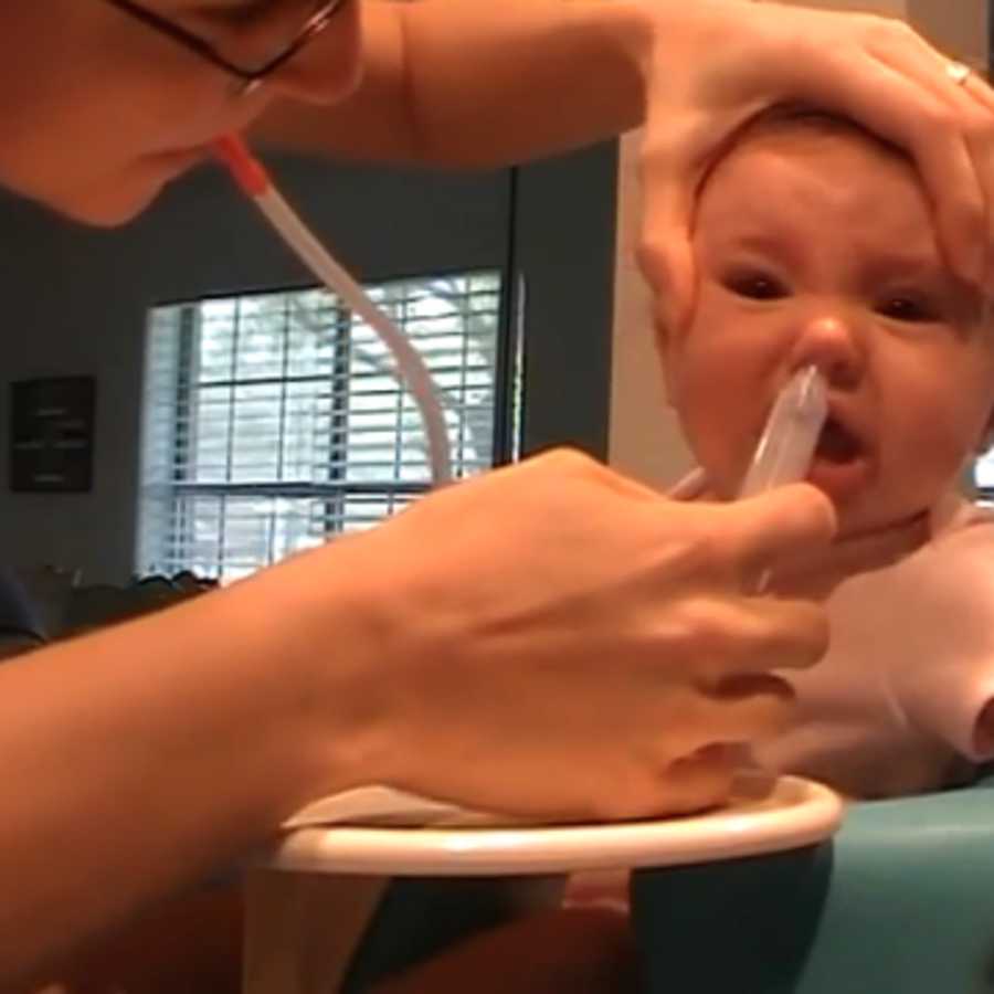 Video of a Mom Sucking Snot Out of Her Baby s Nose Might Just