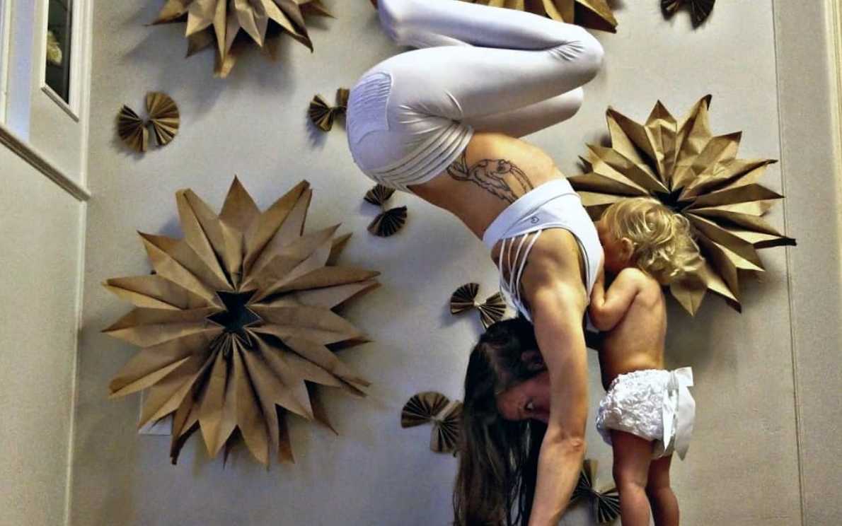 Yoga-loving mother-of-three is pictured breastfeeding her one-month-old  baby in pose