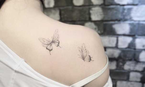 wing tattoo on shoulder blade