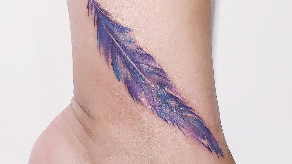 rainbow peacock feather tattoo