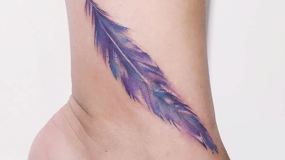 9. Feather Tattoo Inspiration for Women - wide 8