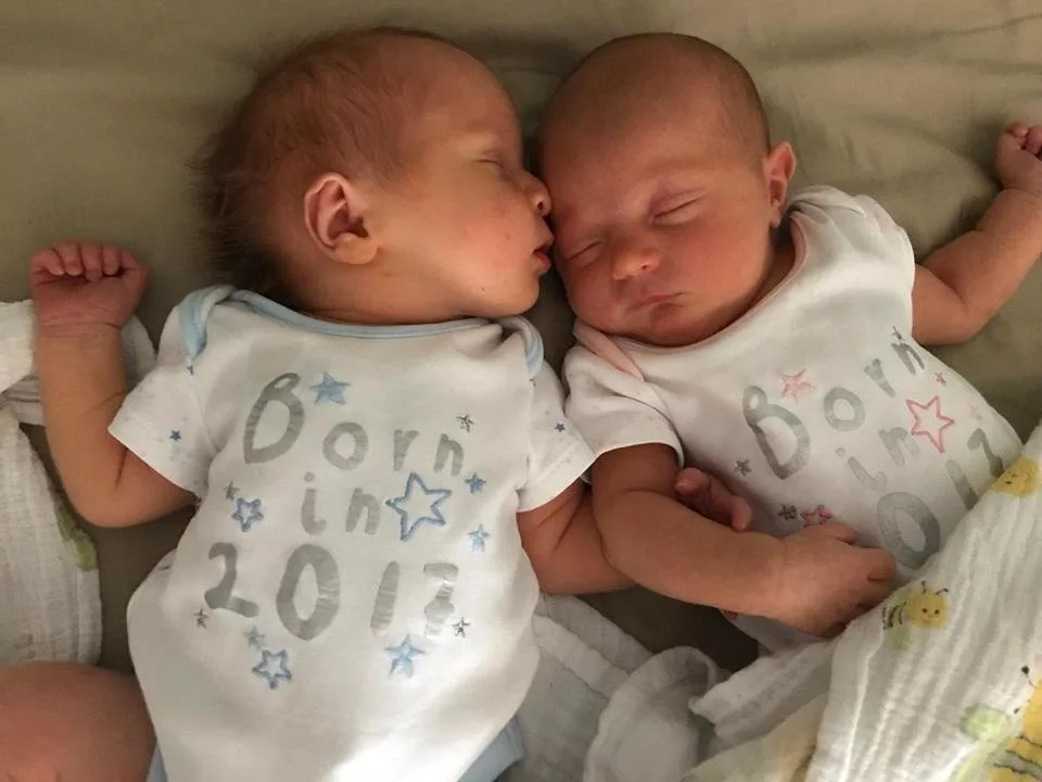 Dads give birth to twins