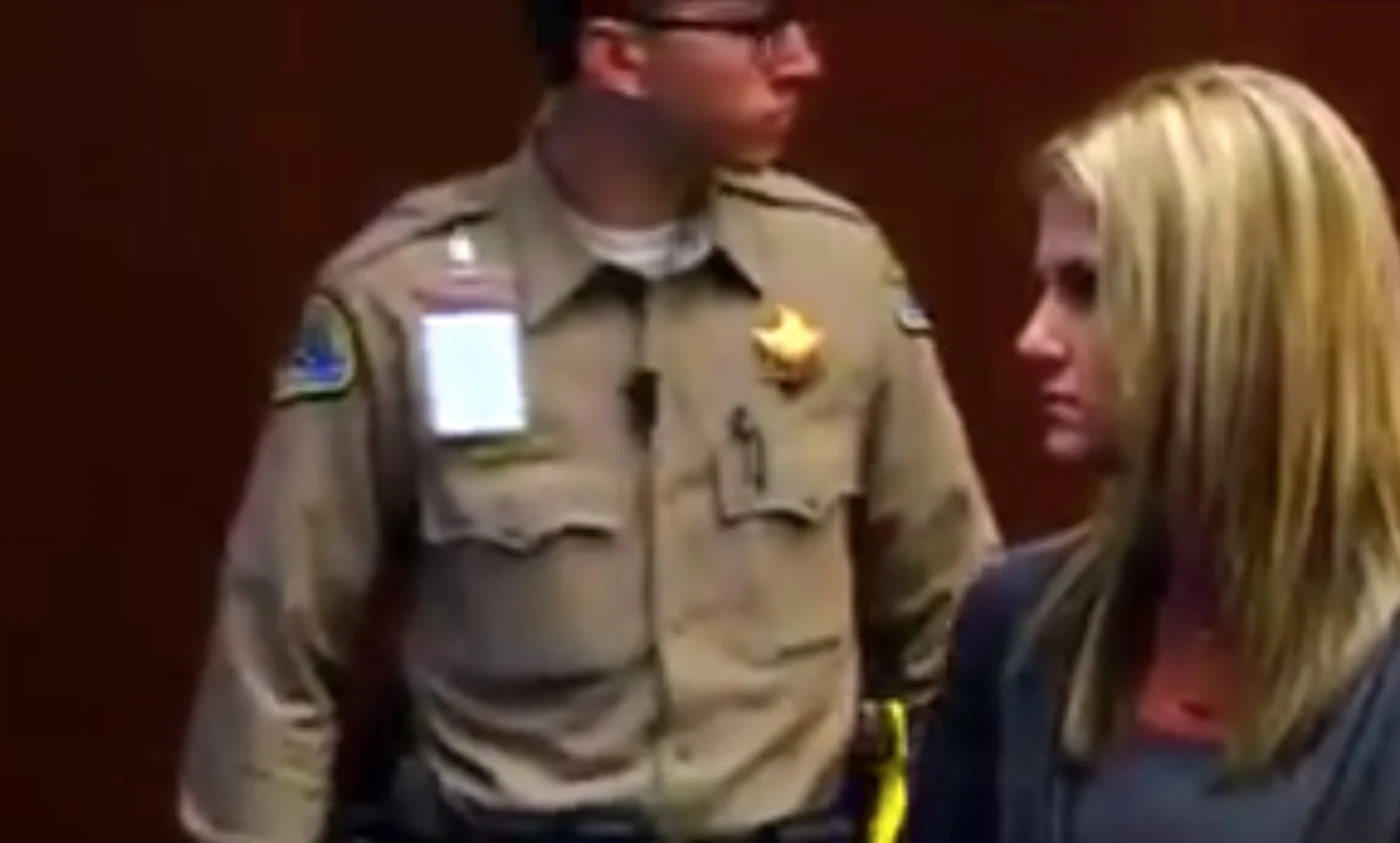 Coral Lytle walks into court during her sentencing hearing.