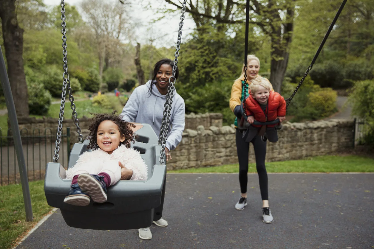 Mom and kids playing