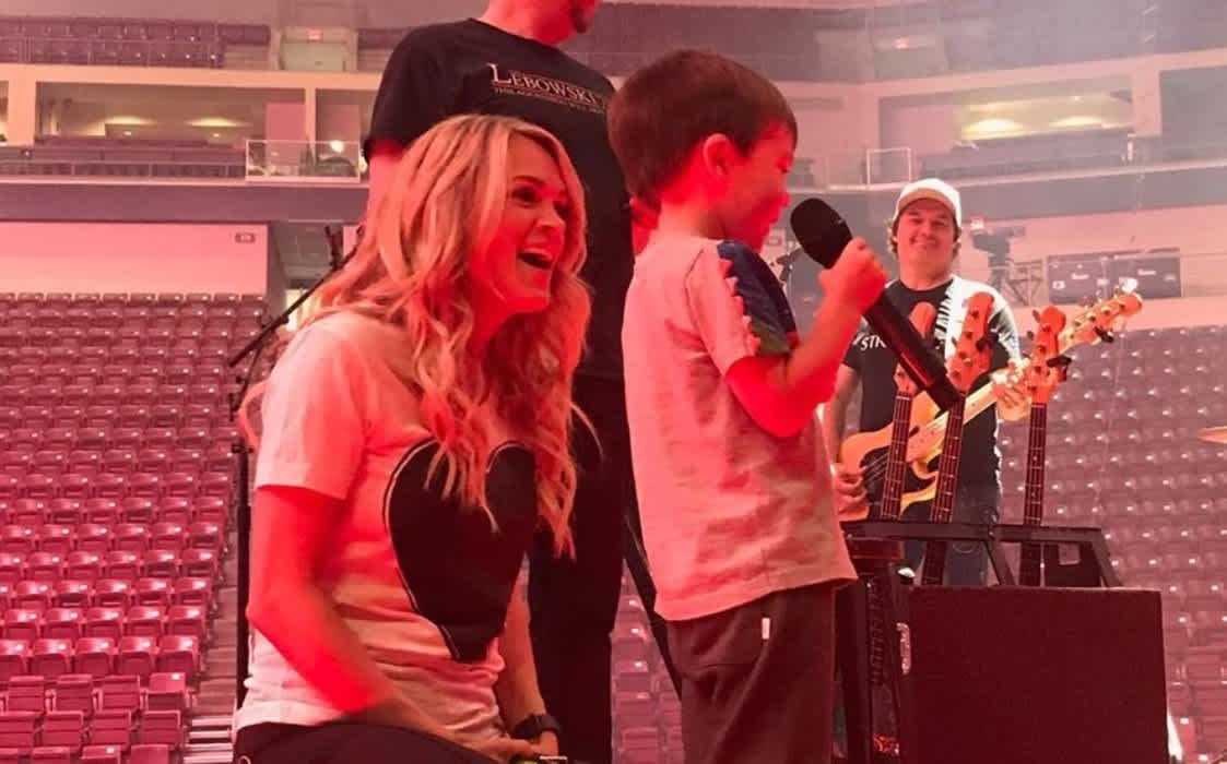 Carrie Underwood enjoys Christmas by 'watching it through my sons
