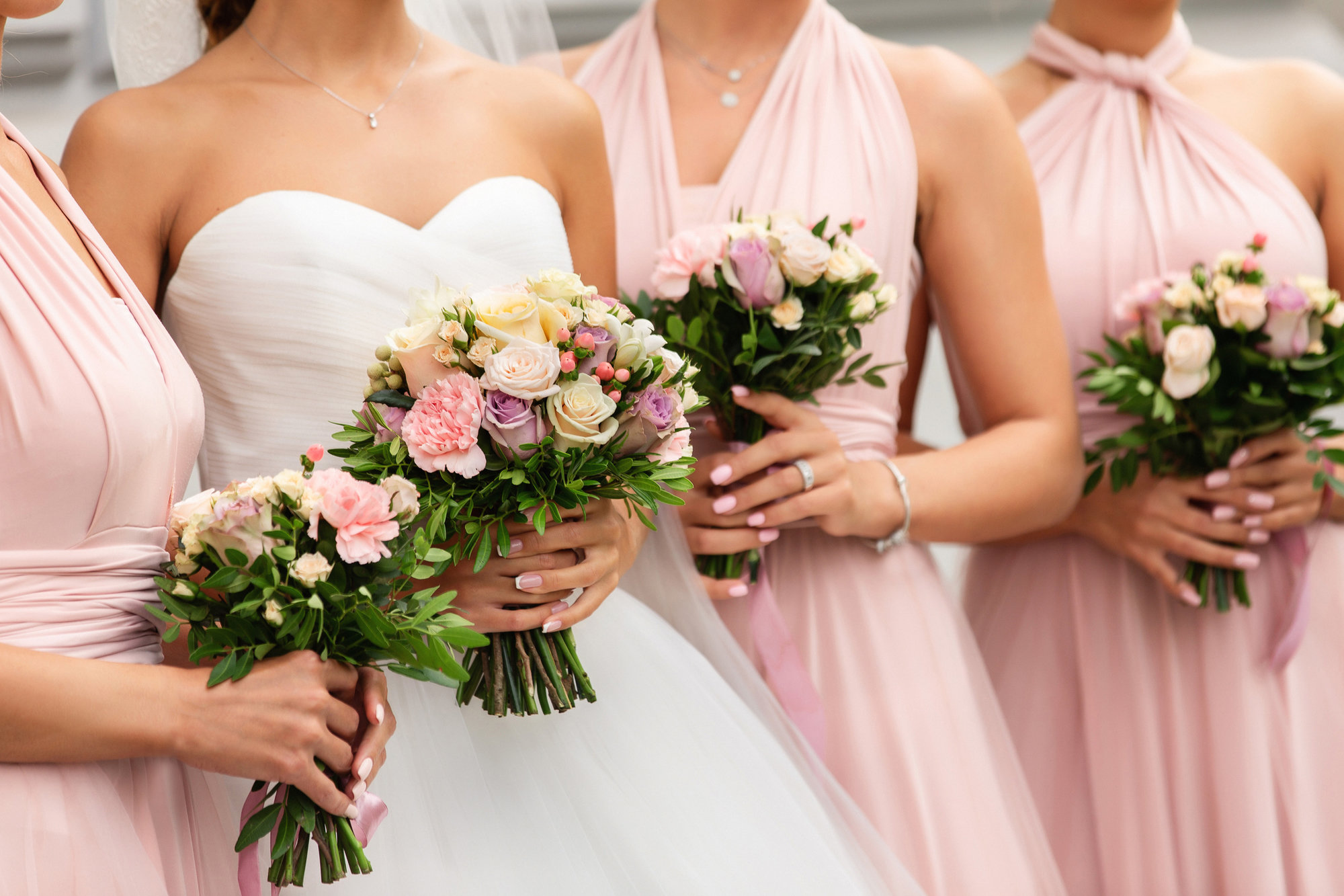 bride with her bridesmaids