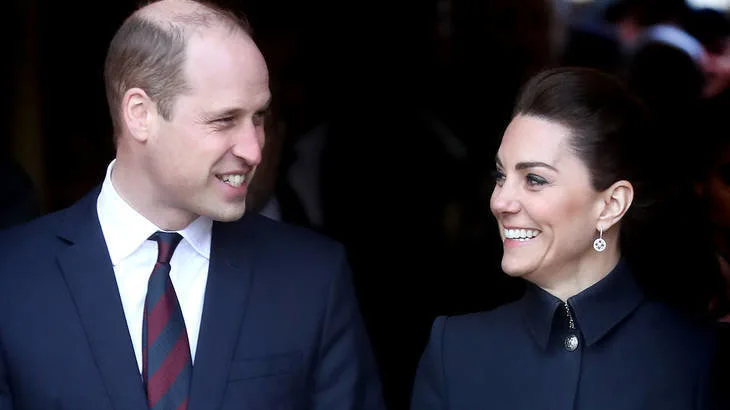 Prince William and Kate Middleton smiling at each other