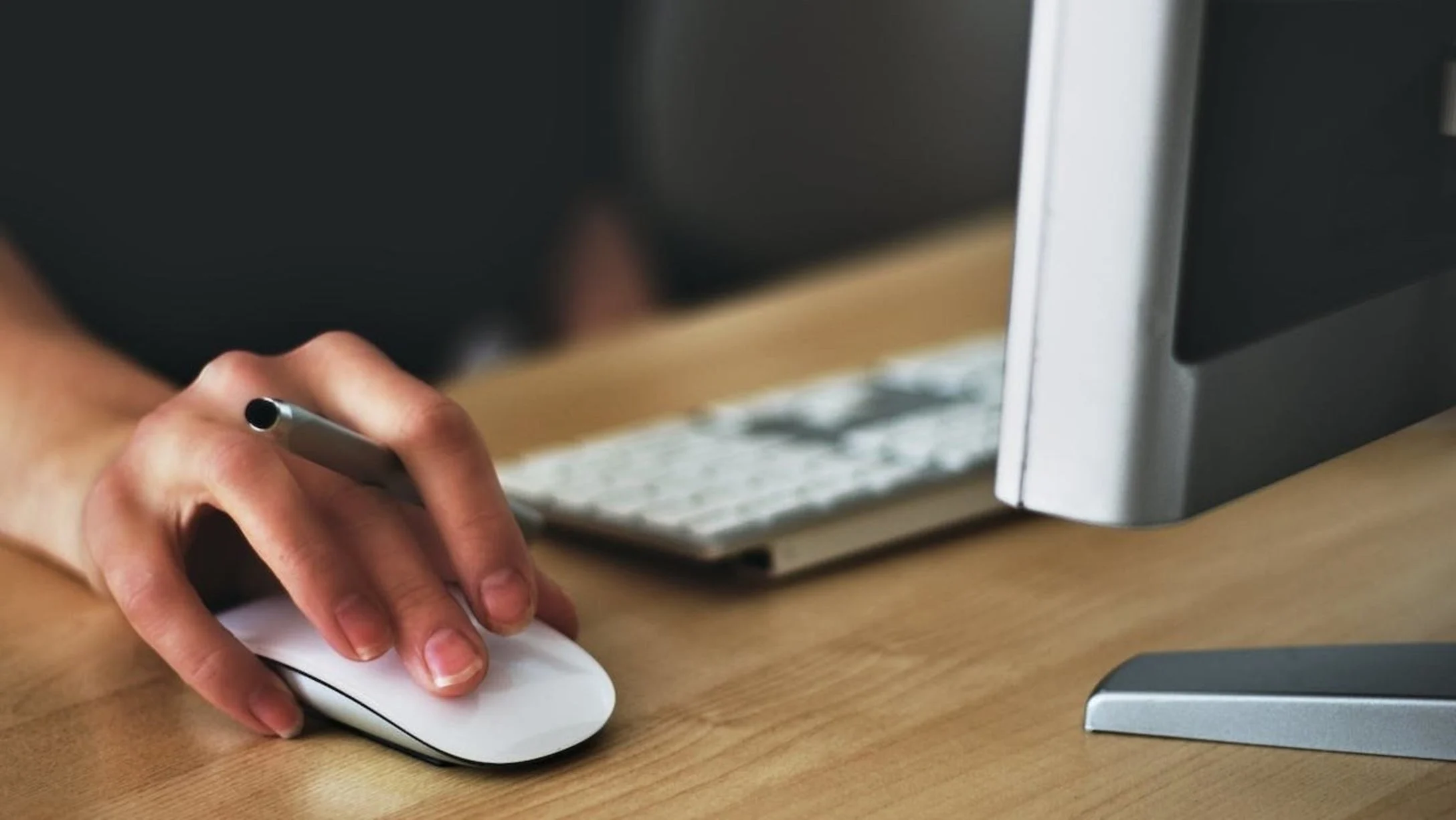 woman using desktop computer