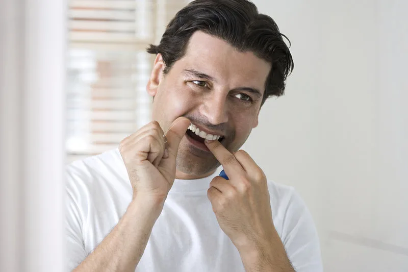 Floss His Teeth