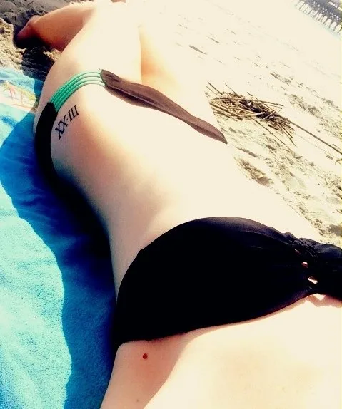 Roman Numeral Hip Tattoo