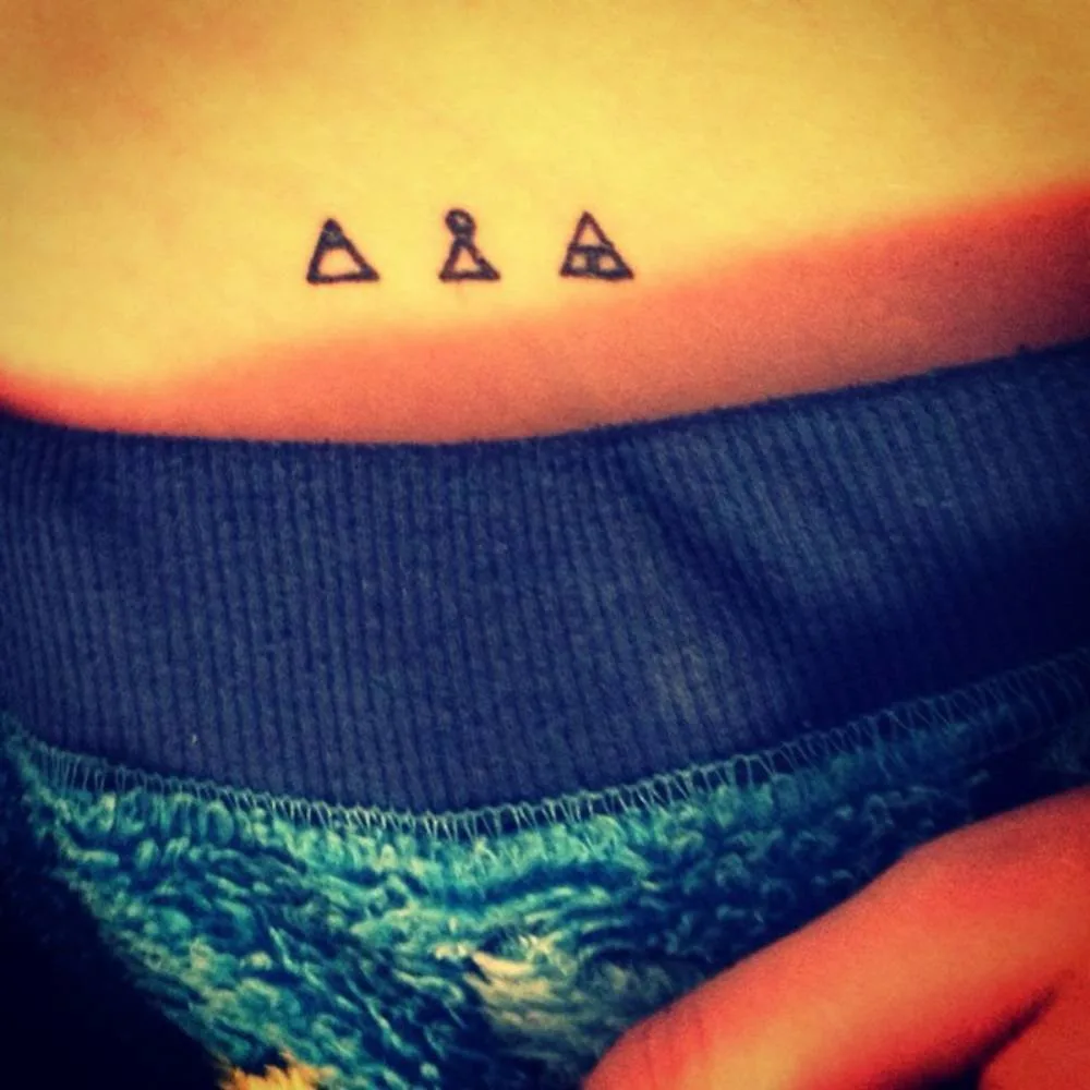 Symbol Hip Tattoos