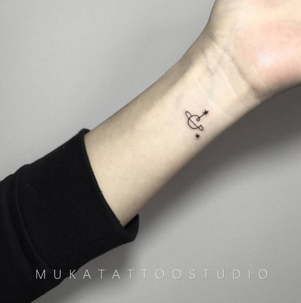 Mockup of a Hand Showing an Inner Wrist Tattoo Against a White Background |  Cat tattoo simple, Tiny cat tattoo, Tattoos