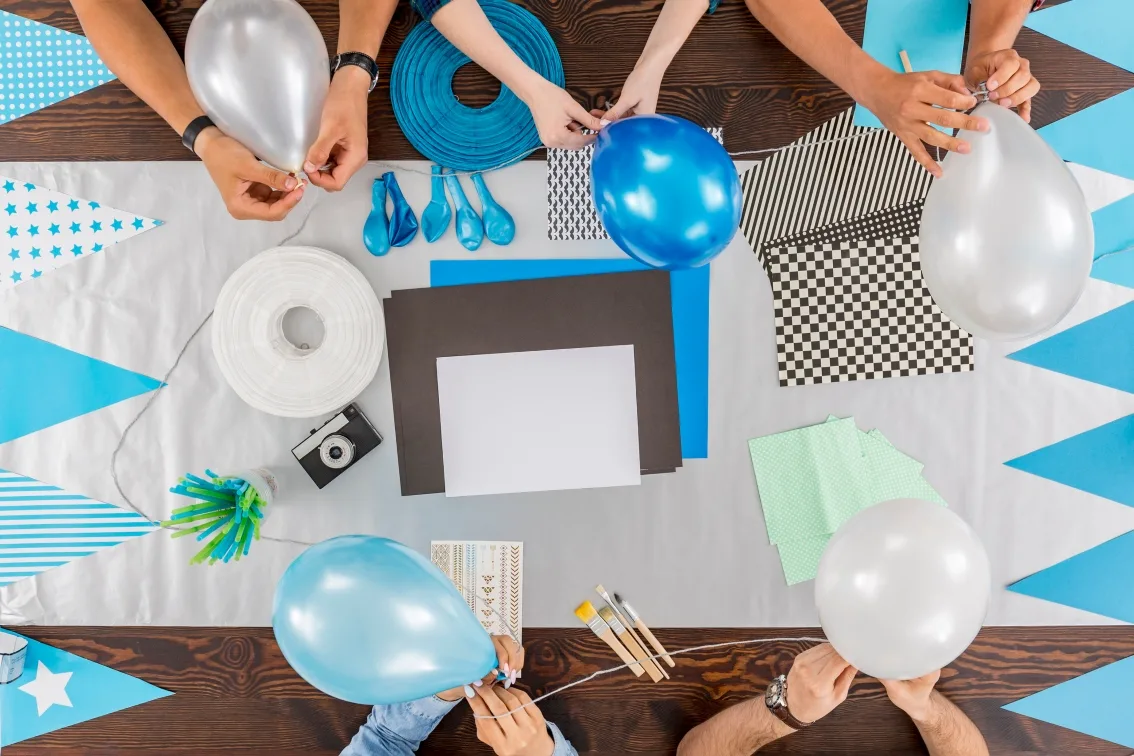 Women doing crafts at baby shower