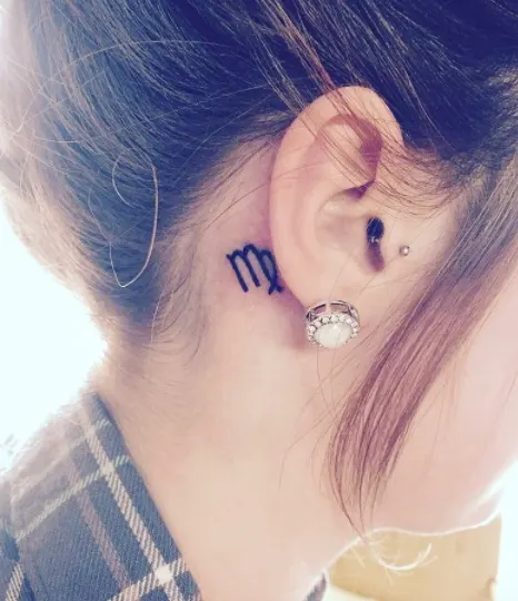 Behind-the-Ear Zodiac Tattoo