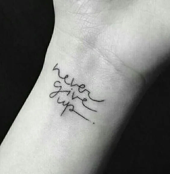 Never Give Up Quote Tattoo
