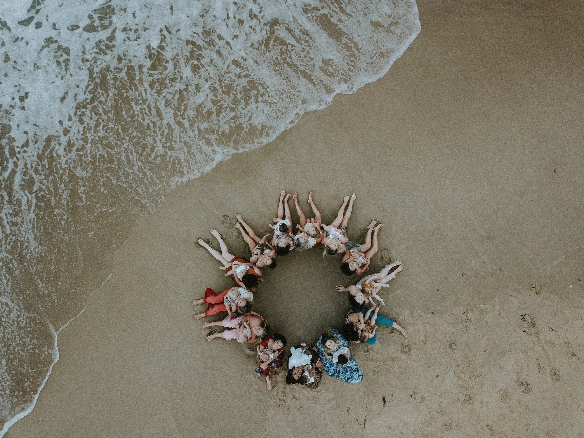 So she invited a group of diverse moms to Kawana Beach for the photo shoot during a full moon.
