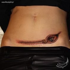 C section scar tattoo that somehow celebrates rather than just covers   Tatuajes de plumas Diseño de tatuaje de pluma Tatuajes