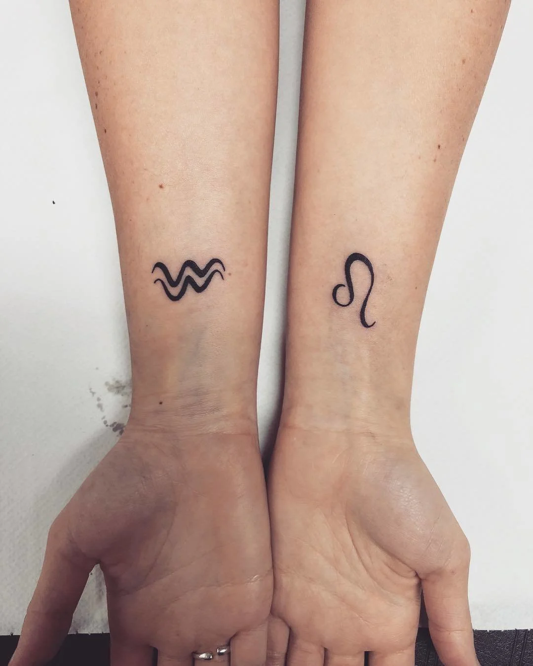 Minimalist Sign Zodiac Tattoos
