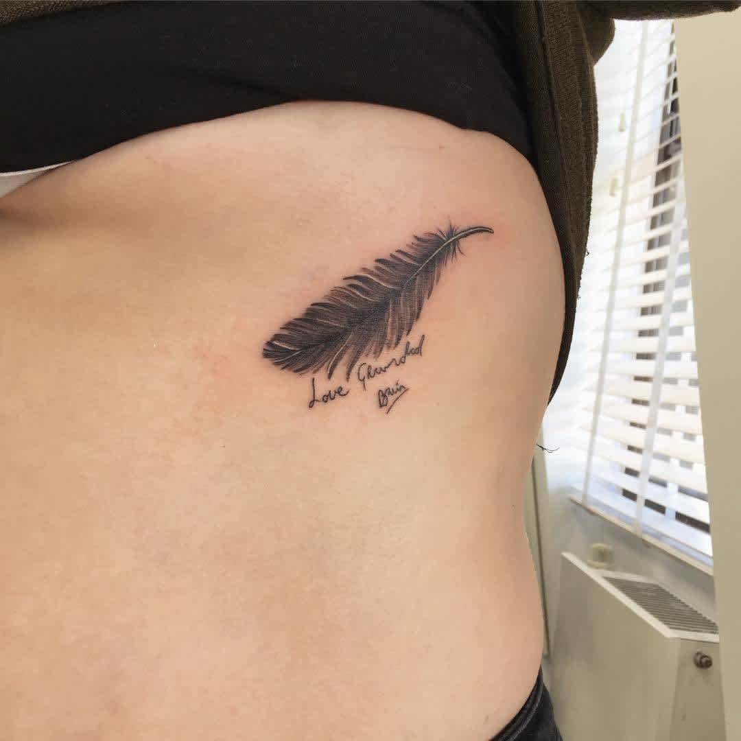Feather First Tattoo