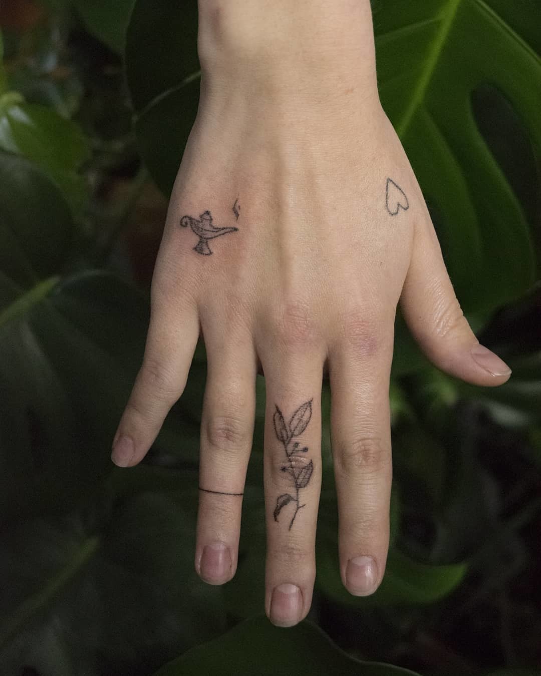 Genie Lamp Small Hand Tattoo