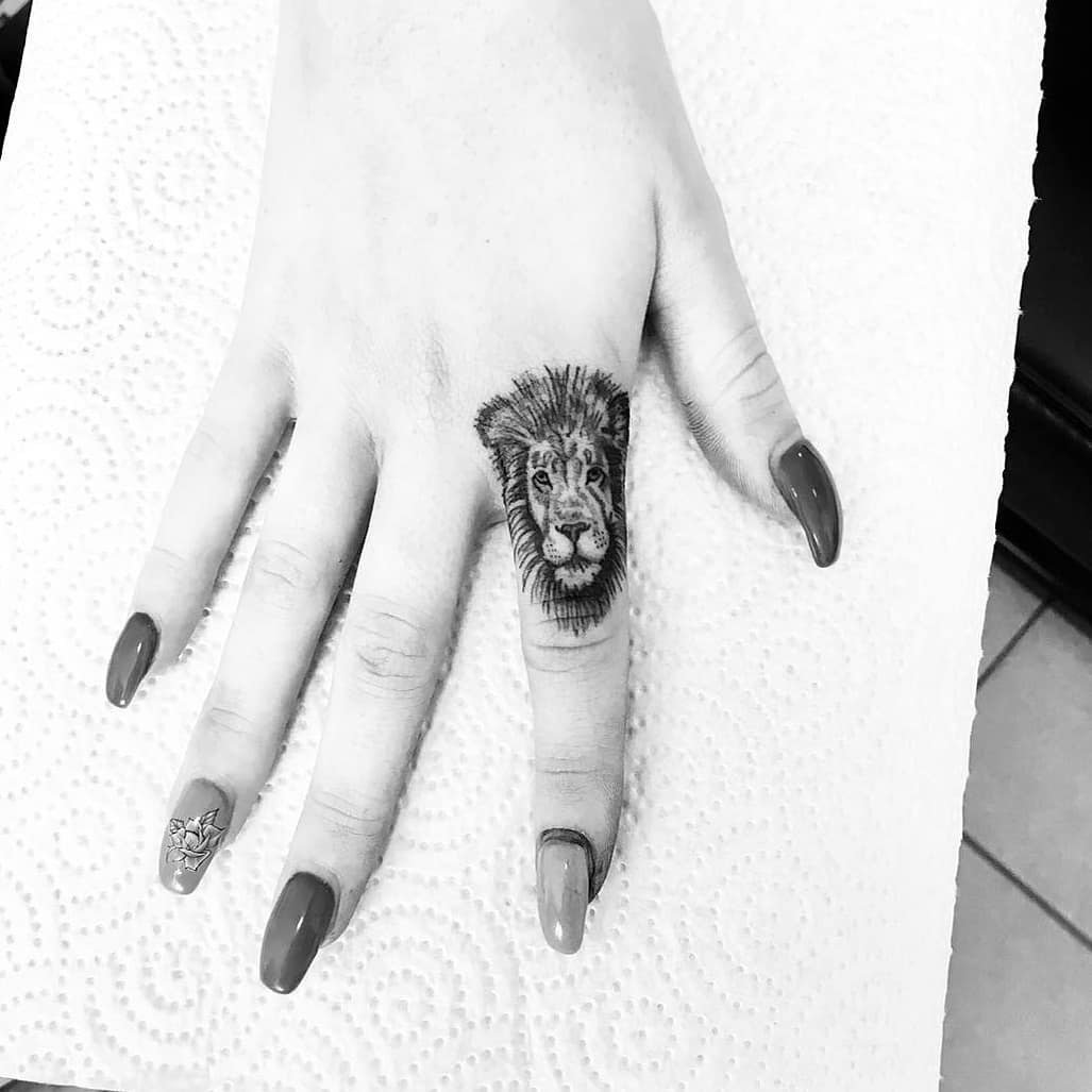 Lion Small Hand Tattoo