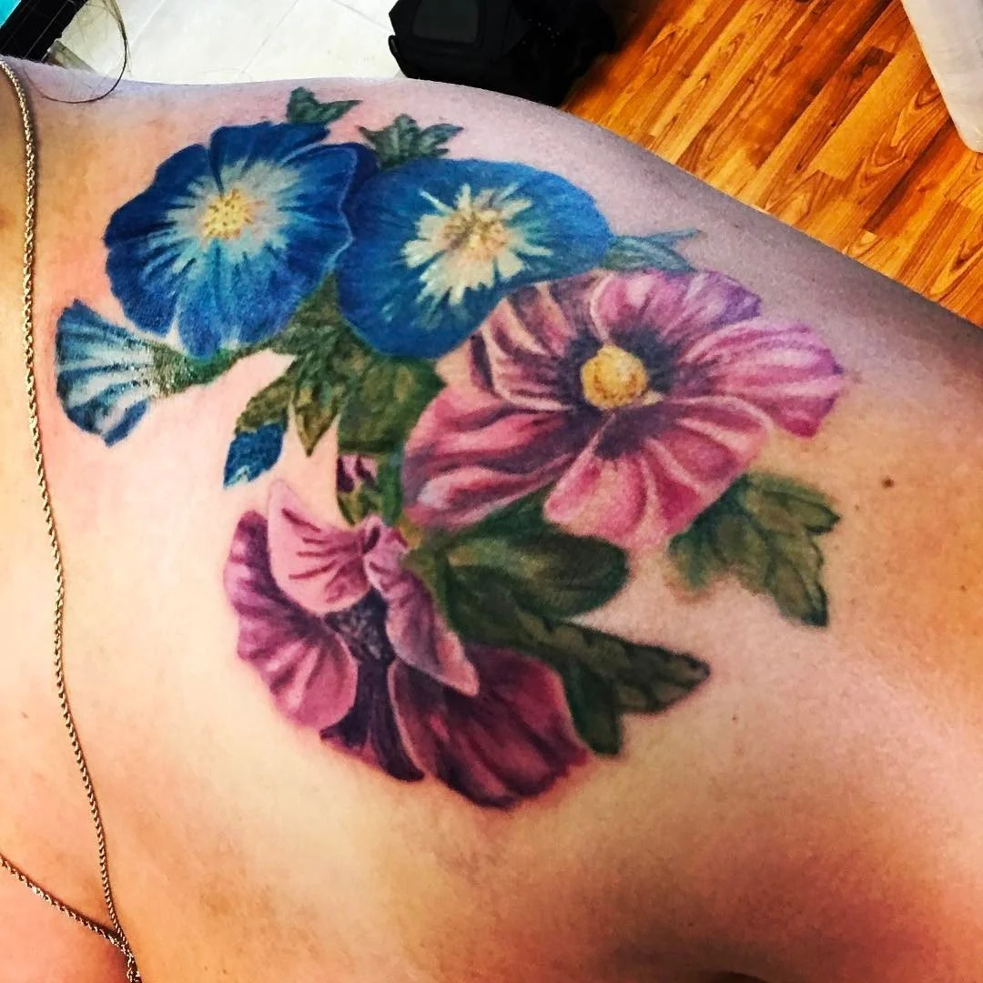Vibrant Vintage Flower Tattoo